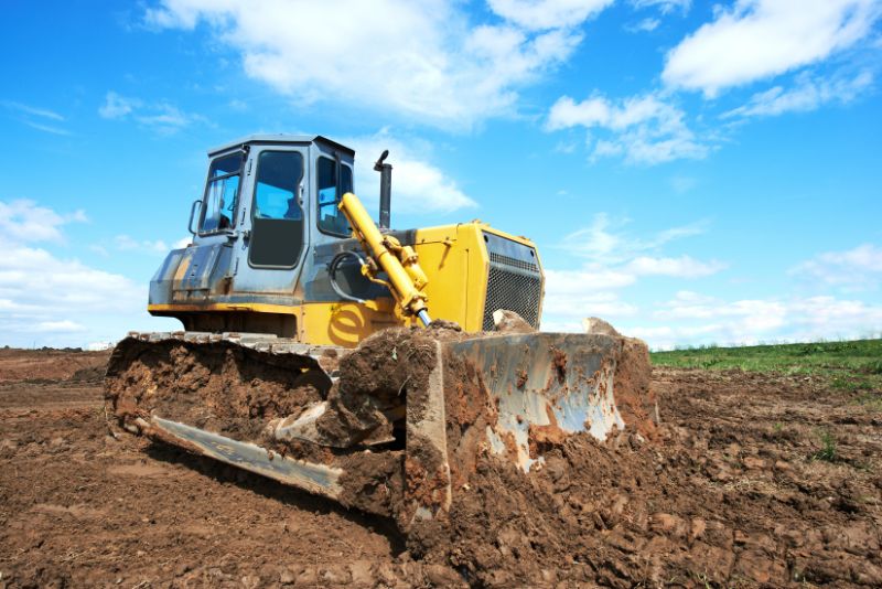 excavator moving earth